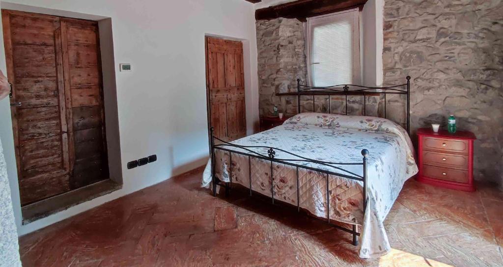 Postel nebo postele na pokoji v ubytování B&B la Curt del Böff