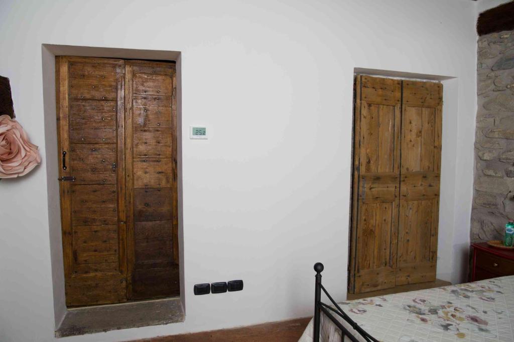Postel nebo postele na pokoji v ubytování B&B la Curt del Böff