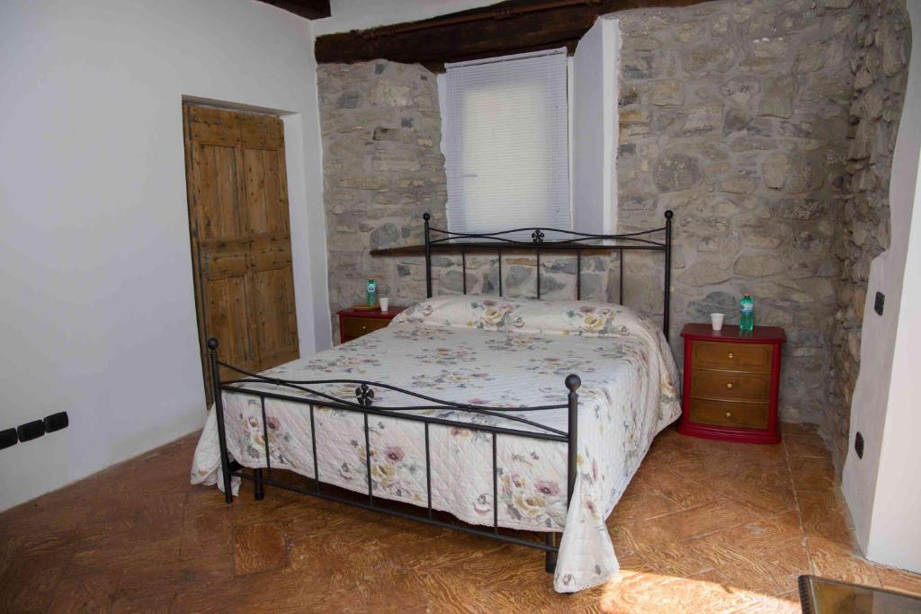 Postel nebo postele na pokoji v ubytování B&B la Curt del Böff