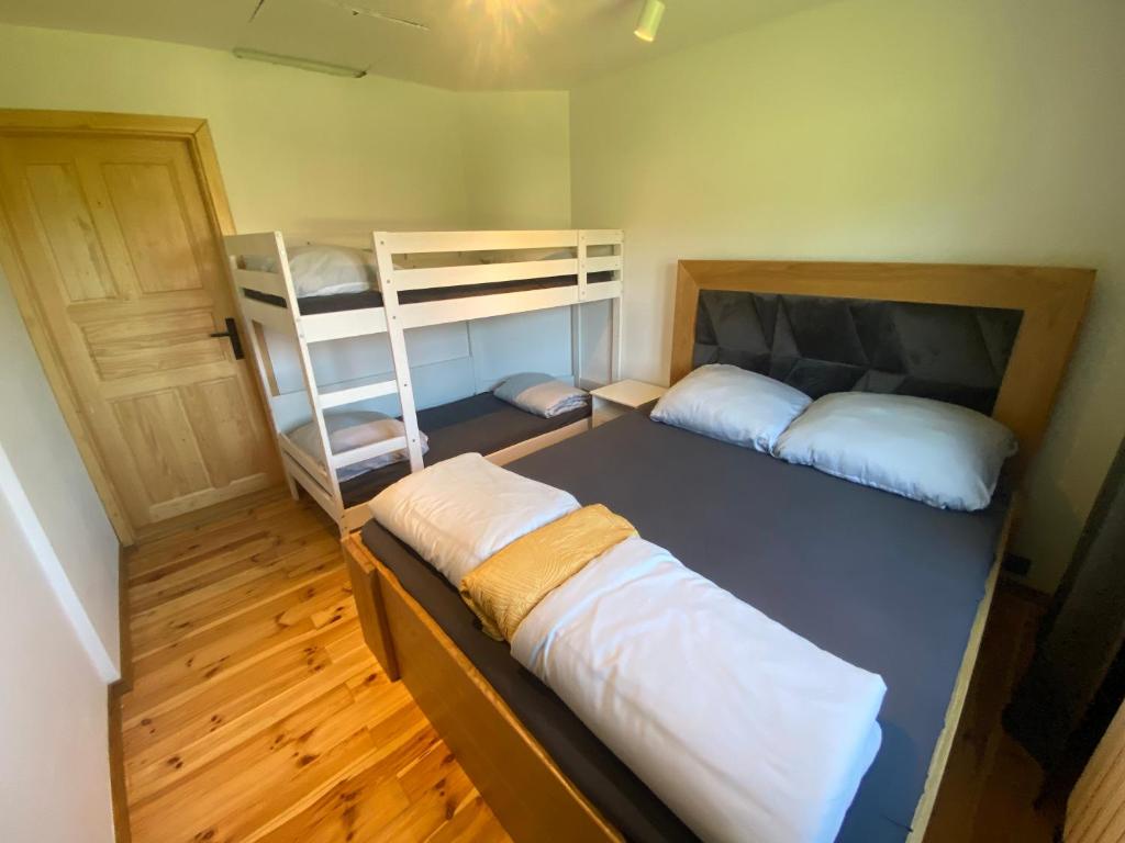 Postel nebo postele na pokoji v ubytování Jurzyków