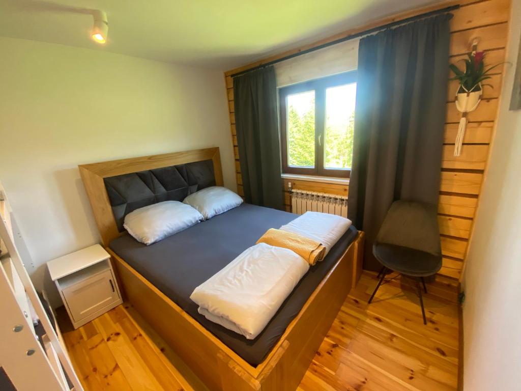 Postel nebo postele na pokoji v ubytování Jurzyków
