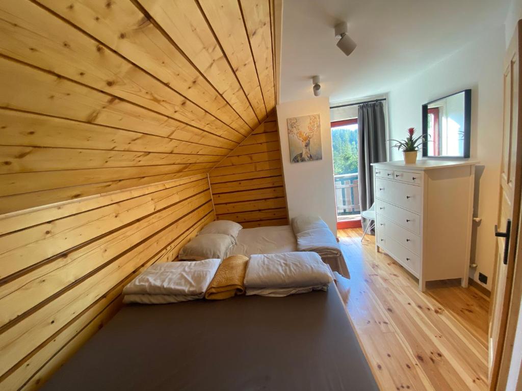 Postel nebo postele na pokoji v ubytování Jurzyków
