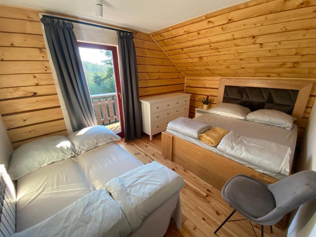 Postel nebo postele na pokoji v ubytování Jurzyków