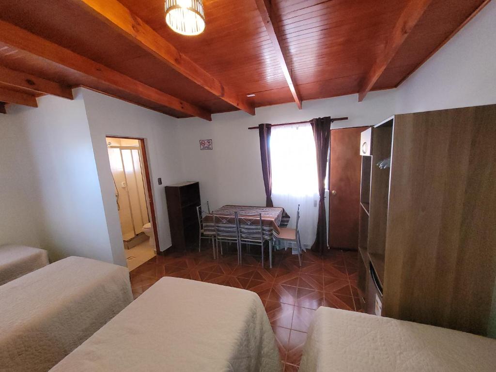 Uma cama ou camas num quarto em Lalck Cketi Hospedaje y Turismo