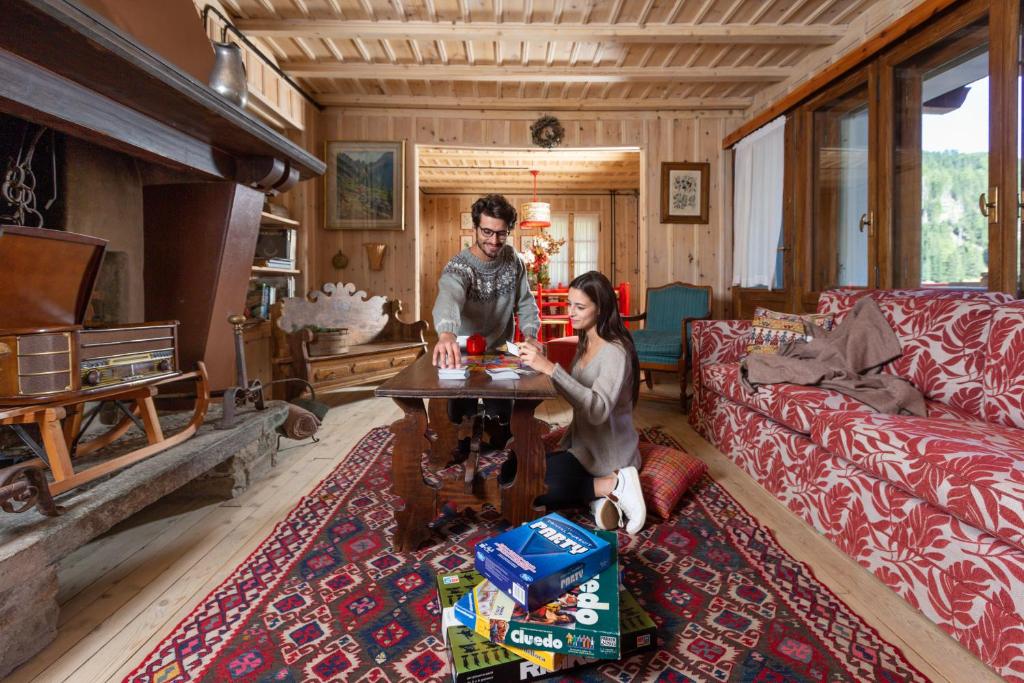 Część wypoczynkowa w obiekcie QC House - Chalet con Sauna