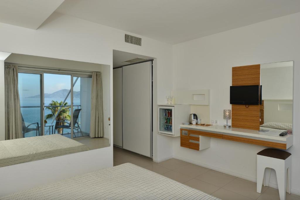 Postel nebo postele na pokoji v ubytování Hotel Delta