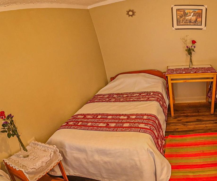 Postel nebo postele na pokoji v ubytování Hotel Willcamayu