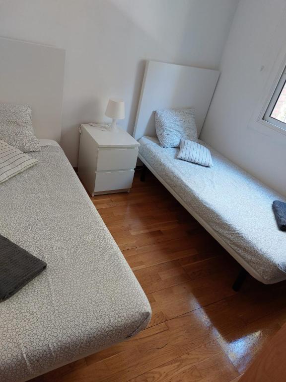 Posteľ alebo postele v izbe v ubytovaní Apartamento tranquilo cerca de la Sagrada Familia