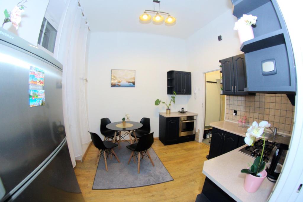 Kuchyňa alebo kuchynka v ubytovaní DreamFlat