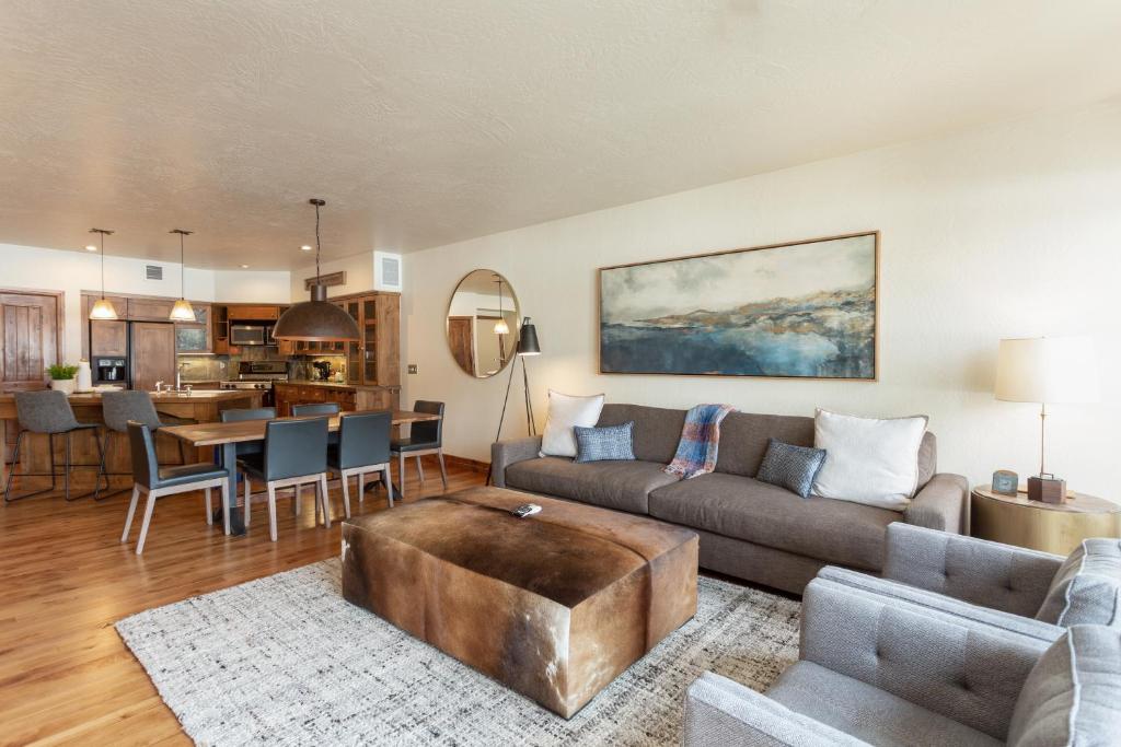a living room with a couch and a table at 1 Bedroom Condo - The Lodges at Deer Valley condo in Park City