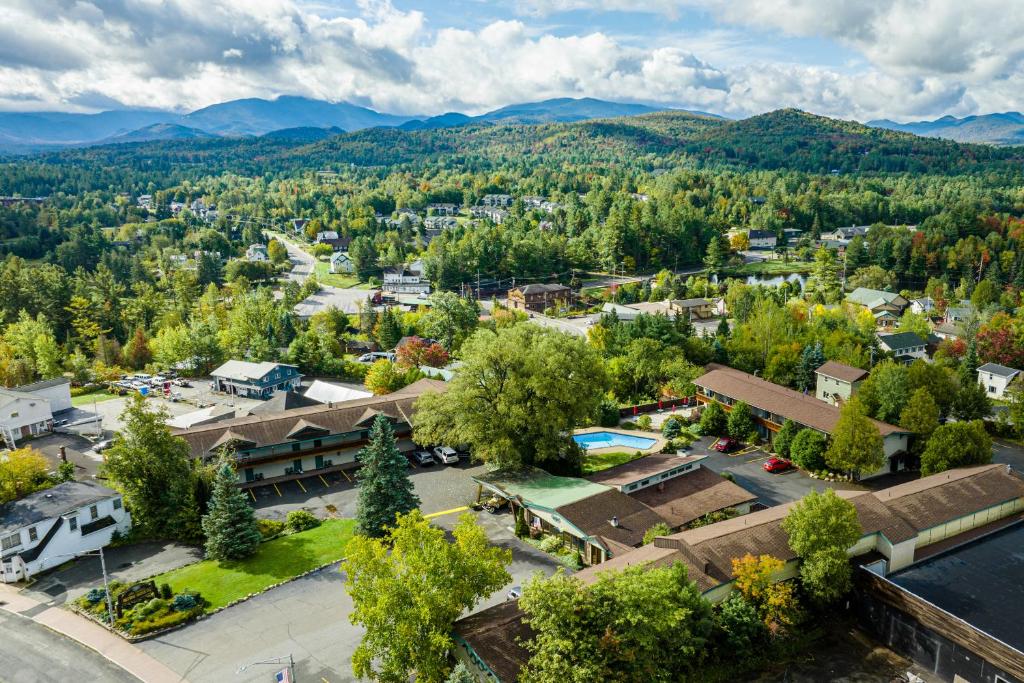 an aerial view of a small town with mountains in the background at The Devlin in Lake Placid