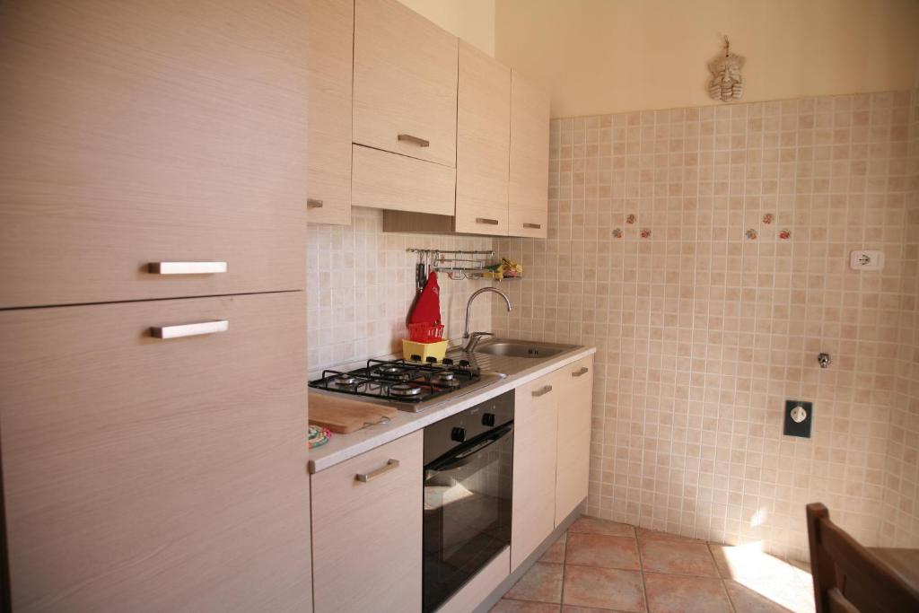 Kuchyň nebo kuchyňský kout v ubytování La Terrazza