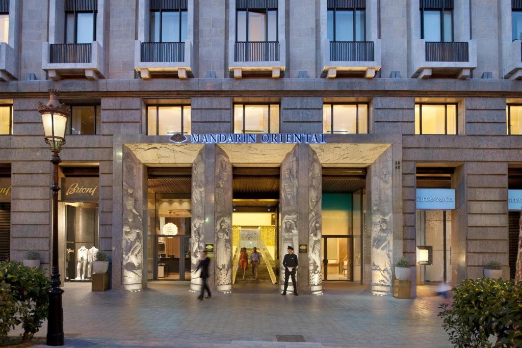 a building with a sign on the front of it at Mandarin Oriental, Barcelona in Barcelona