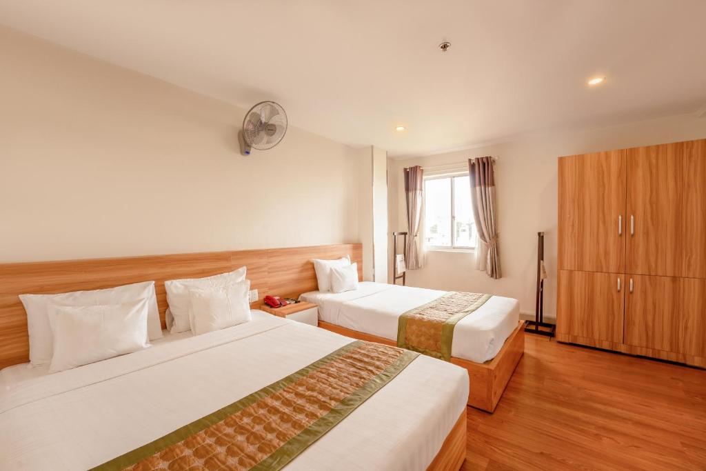 Postel nebo postele na pokoji v ubytování Palago mc Hotel Park View