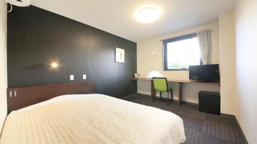 Postel nebo postele na pokoji v ubytování Hotel Coonel Inn