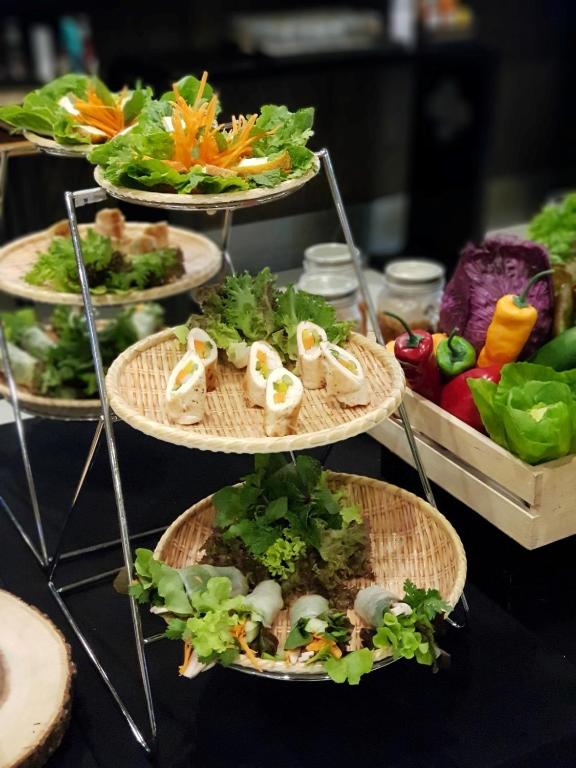 a group of plates of food on a table at FuramaXclusive Sukhumvit in Bangkok