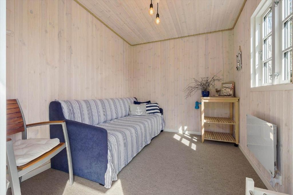 TV a/nebo společenská místnost v ubytování Wellness Oase med Sauna, Fodbad og Højhastighed Internet i Naturens Fred og Ro