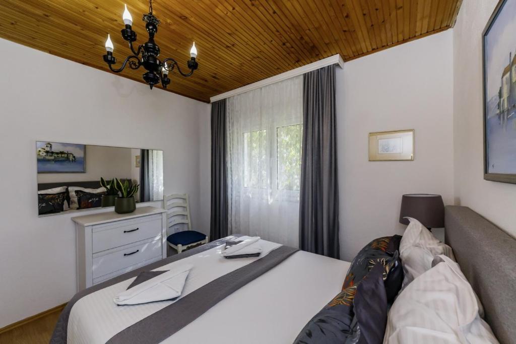 Posteľ alebo postele v izbe v ubytovaní Barba in Trogir - Mittel-Dalmatien