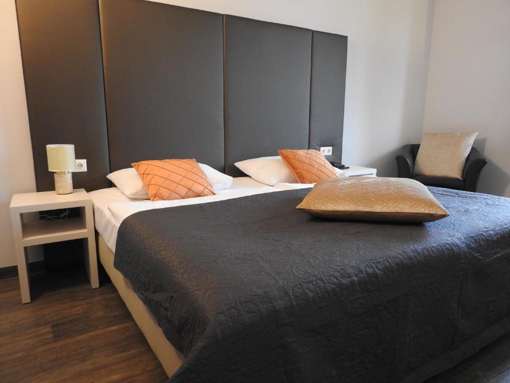 Voodi või voodid majutusasutuse Hotel Marc Aurel toas