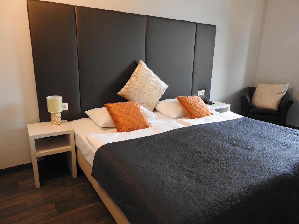 Voodi või voodid majutusasutuse Hotel Marc Aurel toas