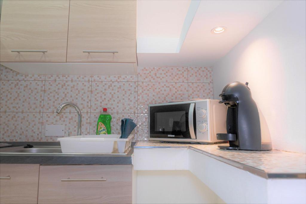 Kuchyň nebo kuchyňský kout v ubytování St. Peter's Pool Holiday Apartment