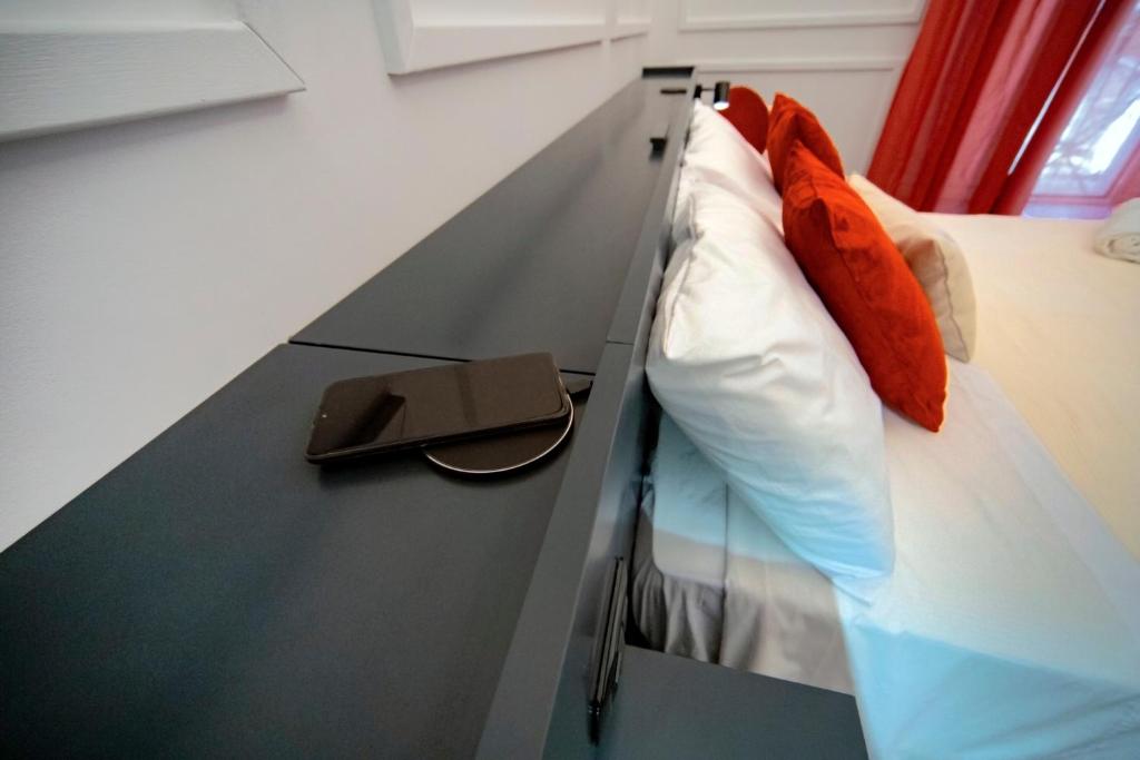 Postel nebo postele na pokoji v ubytování B&B Riccioli