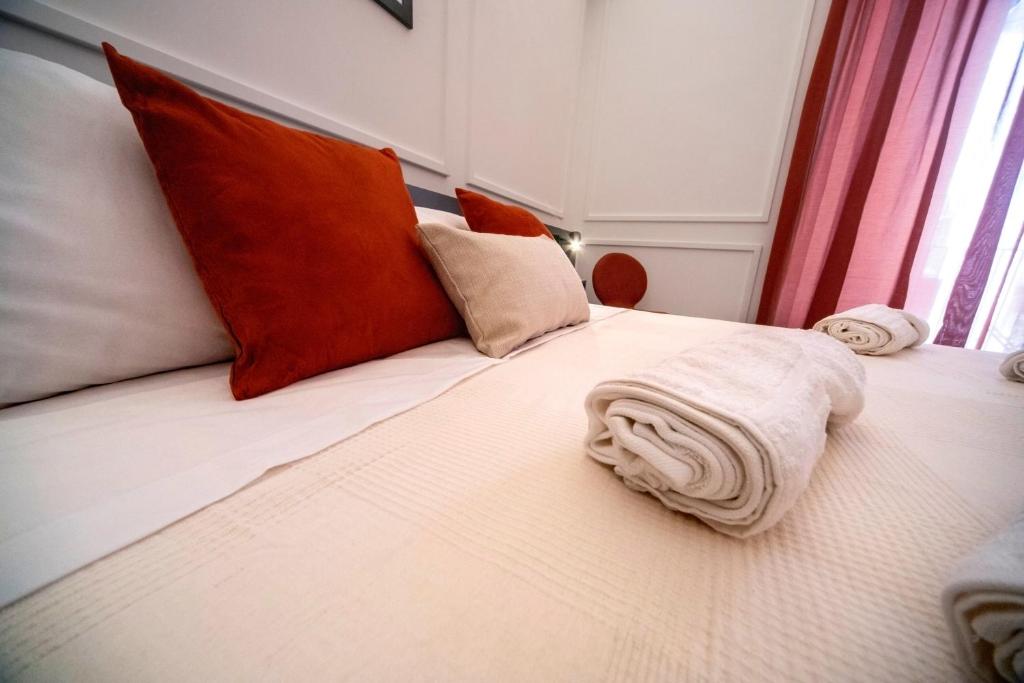 Postel nebo postele na pokoji v ubytování B&B Riccioli