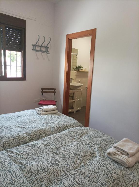 Postel nebo postele na pokoji v ubytování Casa San Isidro