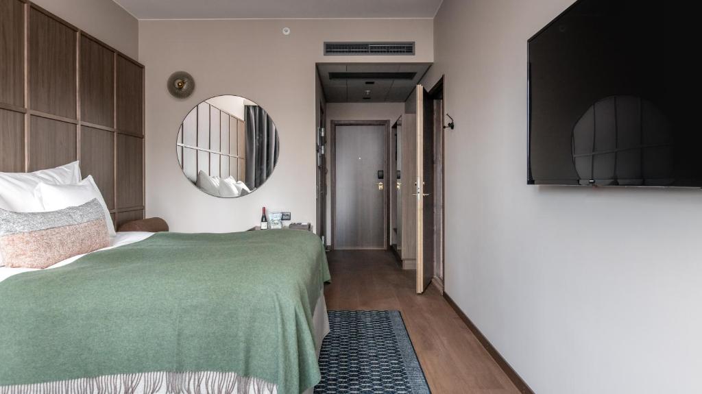 Postel nebo postele na pokoji v ubytování Clarion Hotel Umeå