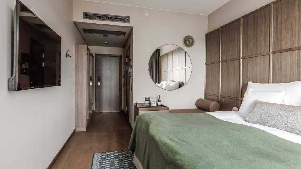 Postel nebo postele na pokoji v ubytování Clarion Hotel Umeå