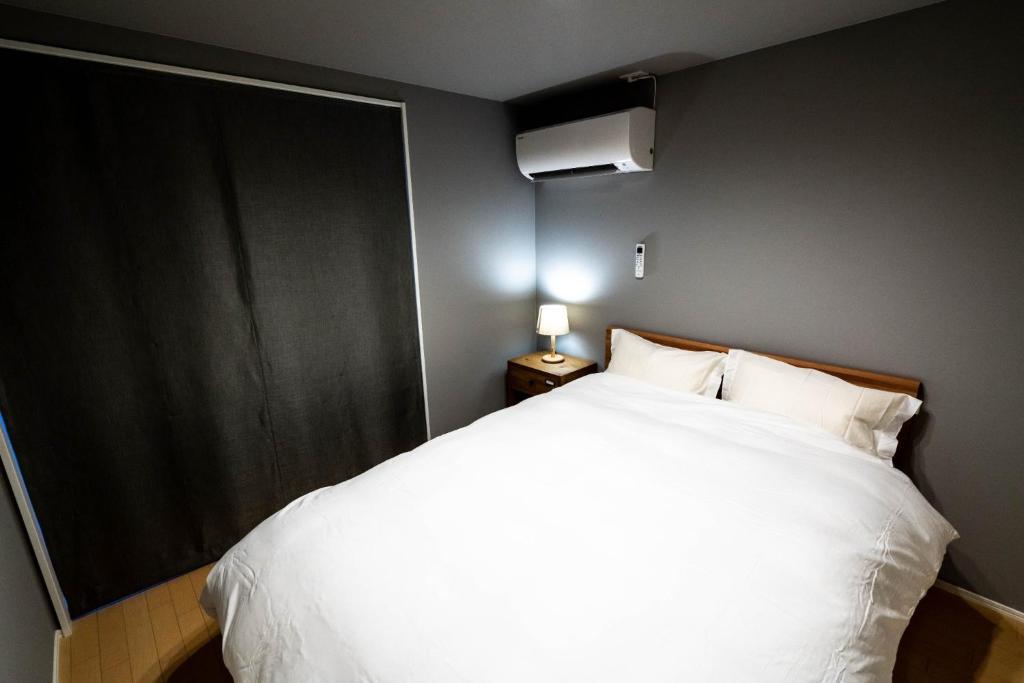 Rakuten STAY HOUSE x WILL STYLE Hachimanboriにあるベッド