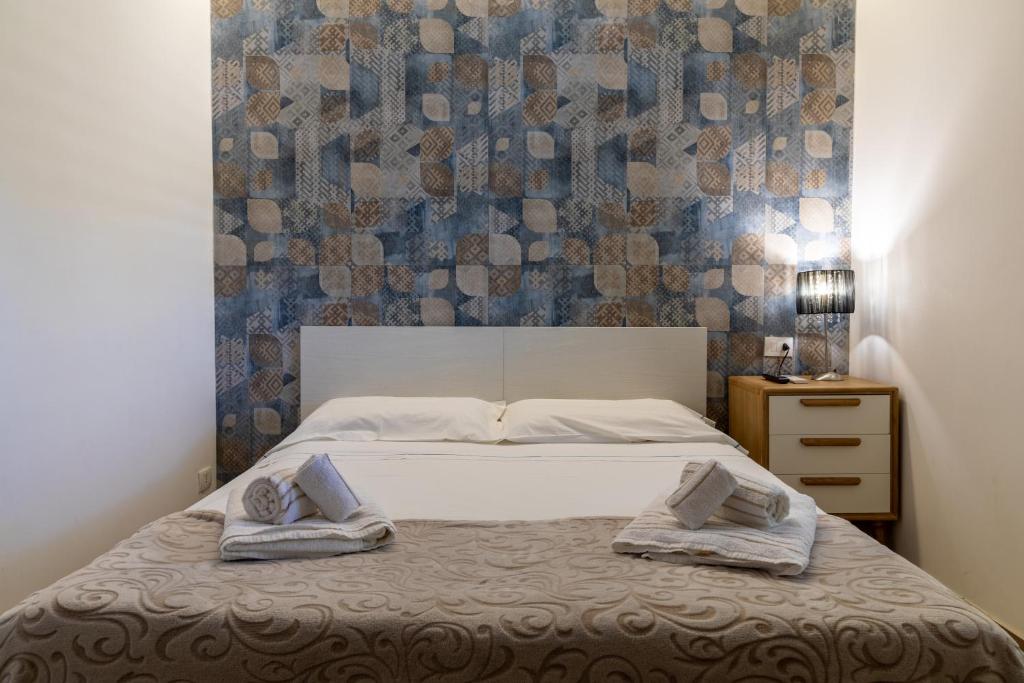 Posteľ alebo postele v izbe v ubytovaní Saija Apartment con piscina