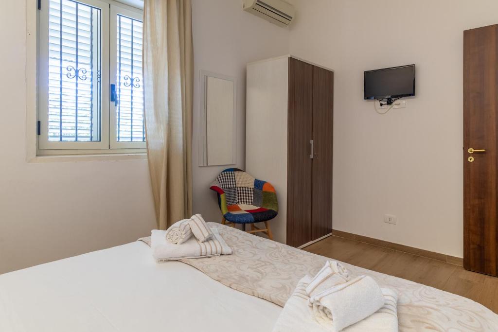 Posteľ alebo postele v izbe v ubytovaní Saija Apartment con piscina