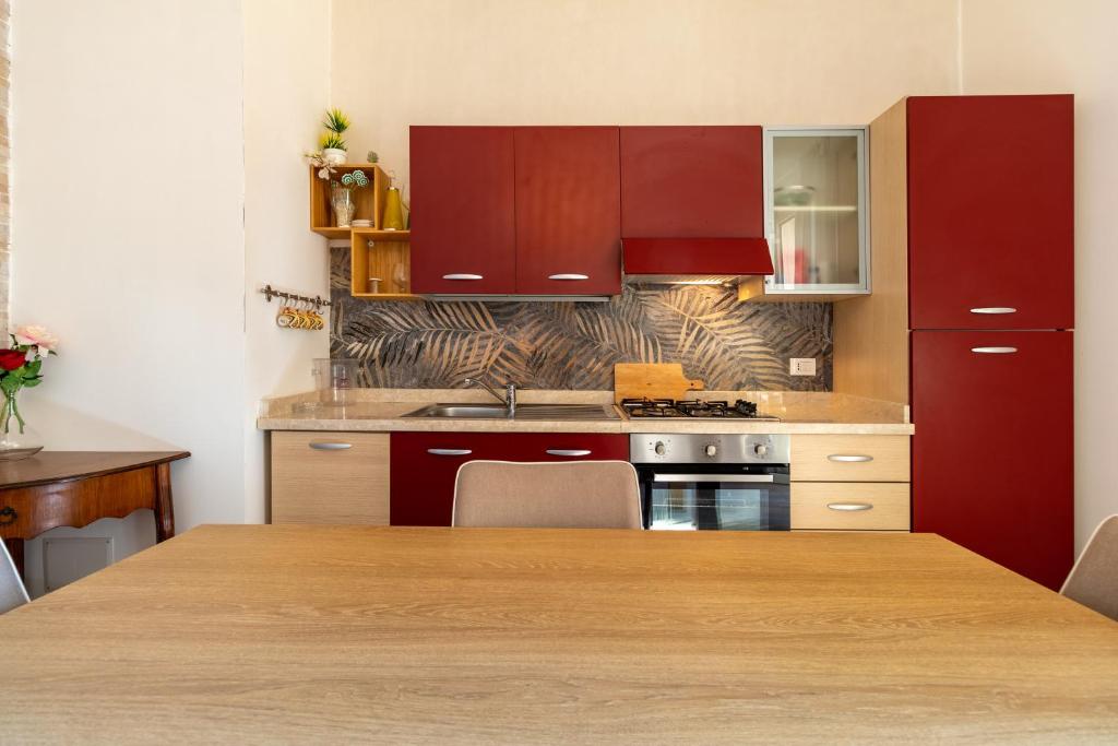 Kuchyňa alebo kuchynka v ubytovaní Saija Apartment con piscina