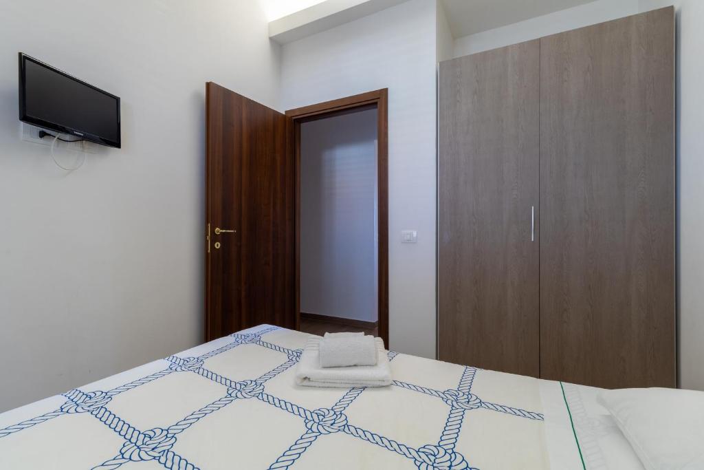 Posteľ alebo postele v izbe v ubytovaní Saija Apartment con piscina