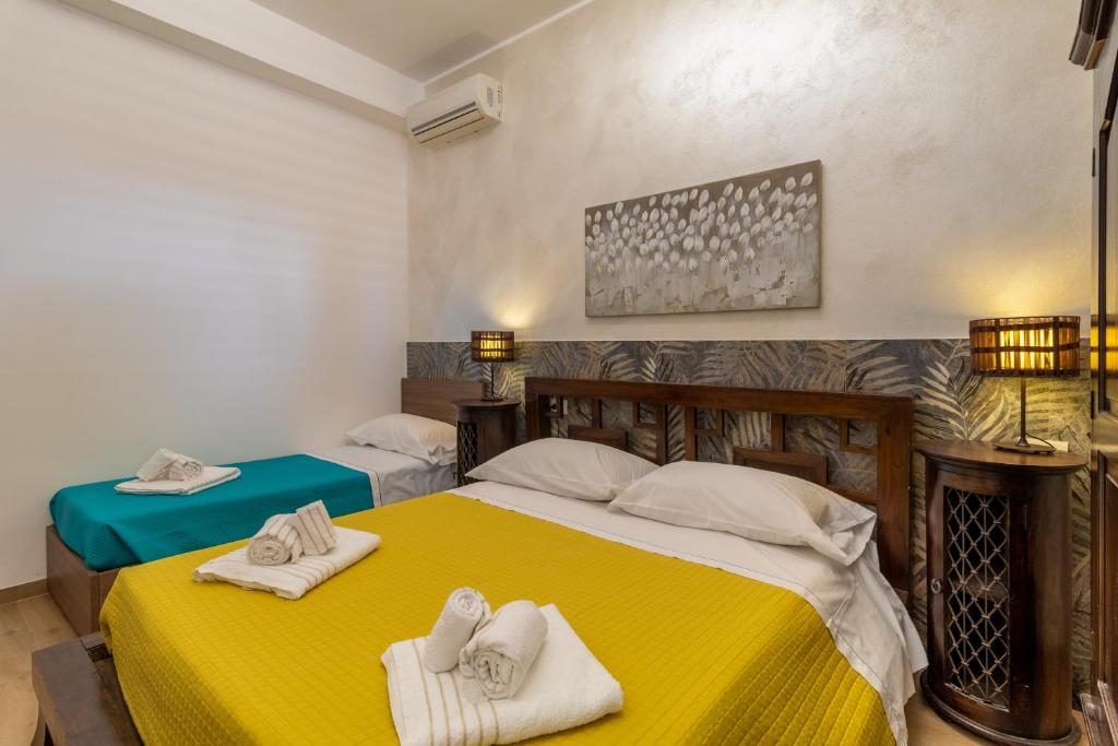 Posteľ alebo postele v izbe v ubytovaní Saija Apartment con piscina