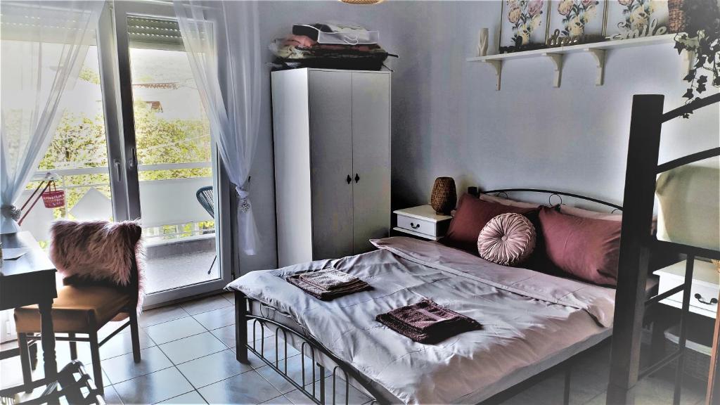 Łóżko lub łóżka w pokoju w obiekcie Apartment Marina 3