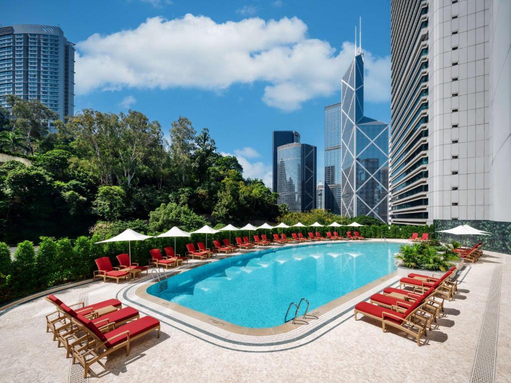 a large pool of water in front of a large building at Island Shangri-La, Hong Kong in Hong Kong