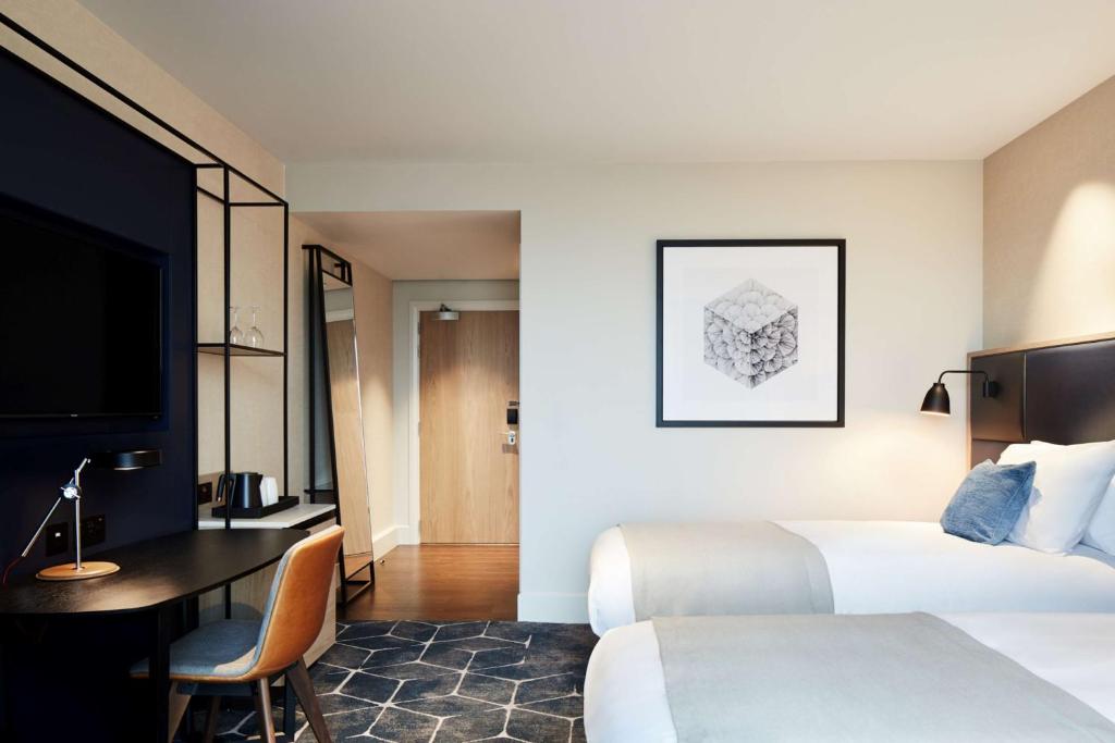 Postel nebo postele na pokoji v ubytování Hyatt Regency Manchester