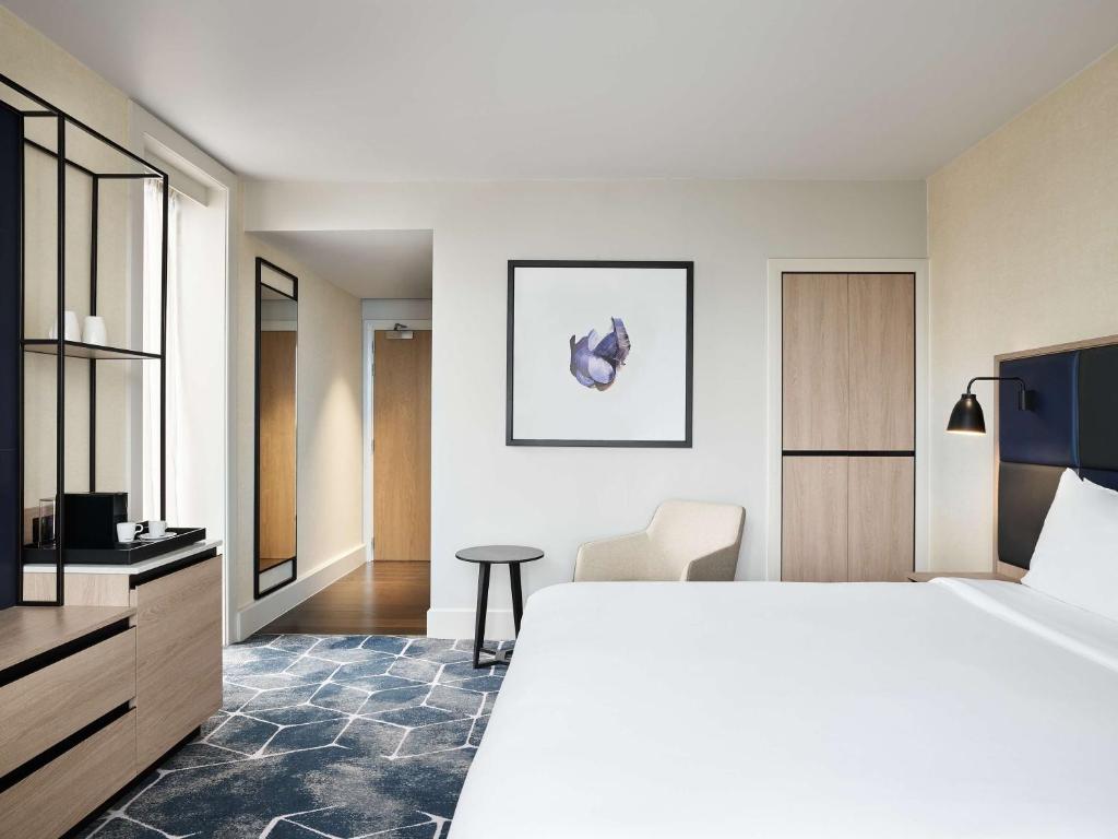 Postel nebo postele na pokoji v ubytování Hyatt Regency Manchester