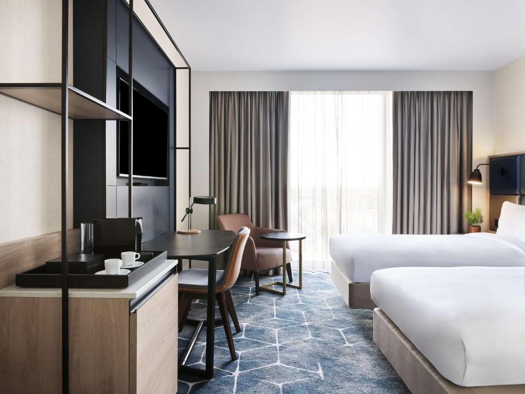 Postel nebo postele na pokoji v ubytování Hyatt Regency Manchester