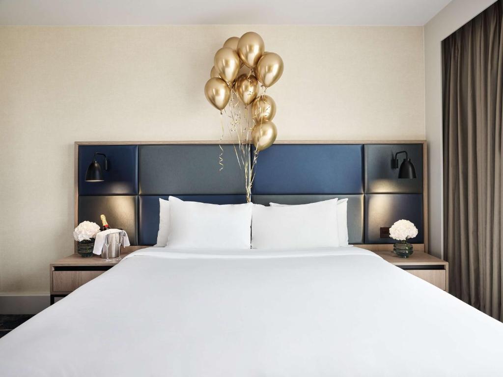 Postel nebo postele na pokoji v ubytování Hyatt Regency Manchester