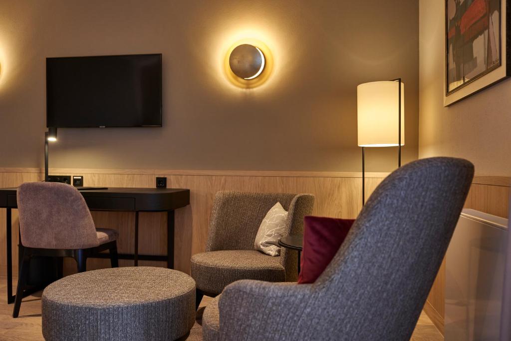 TV a/nebo společenská místnost v ubytování Hotel zur Waldbahn