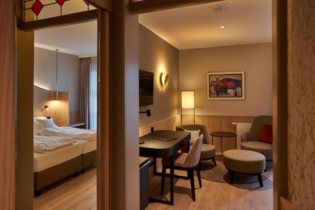 Postel nebo postele na pokoji v ubytování Hotel zur Waldbahn