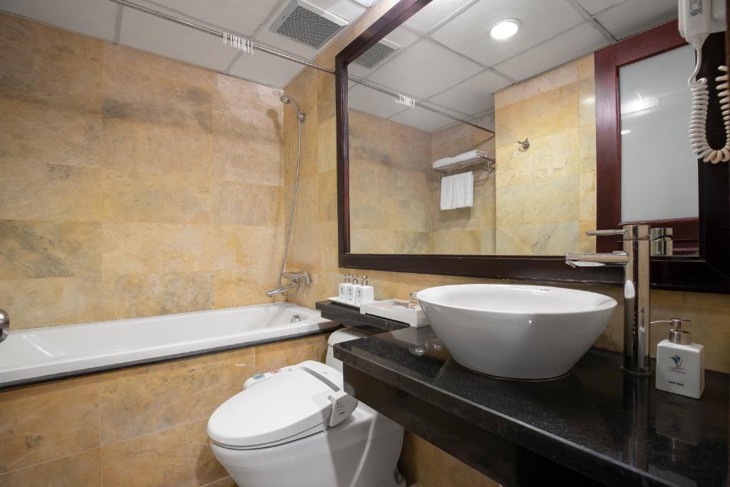 Koupelna v ubytování TK123 Hanoi Hotel