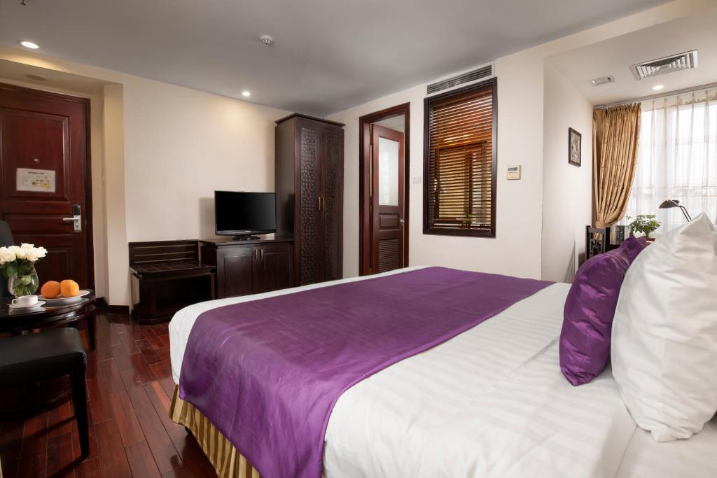 TV a/nebo společenská místnost v ubytování TK123 Hanoi Hotel