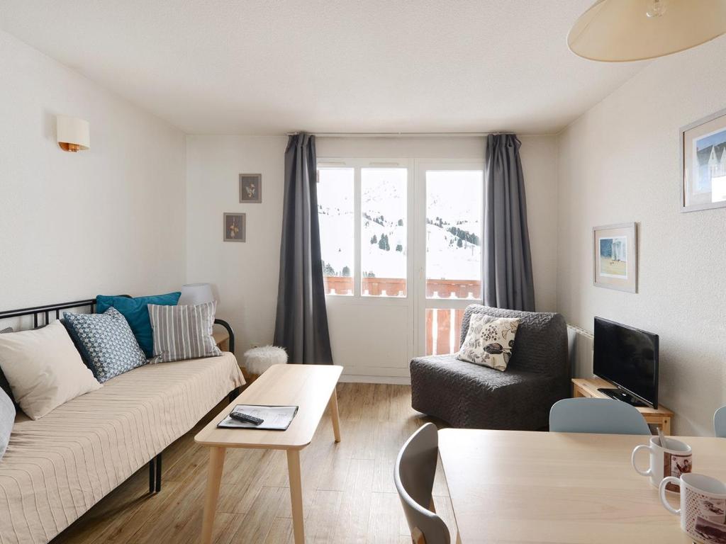 Posezení v ubytování Appartement cosy proche pistes - Balcon et Wifi - FR-1-181-1017