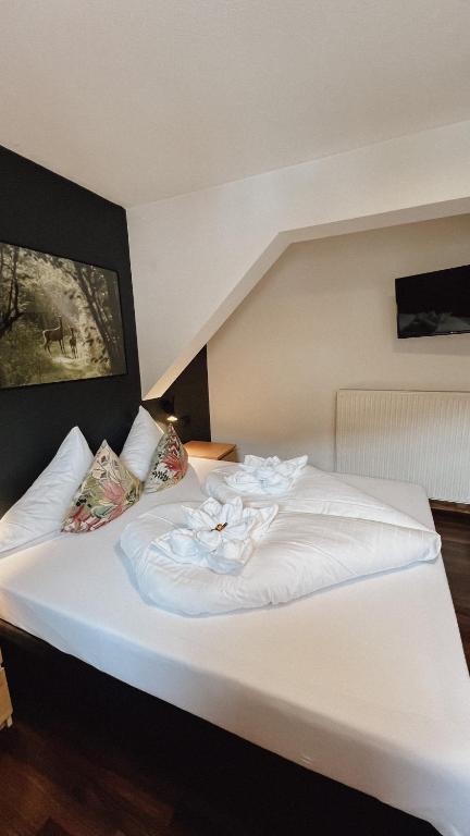 Postel nebo postele na pokoji v ubytování Seehotel Sissi