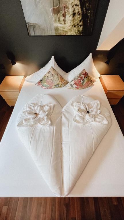 Postel nebo postele na pokoji v ubytování Seehotel Sissi