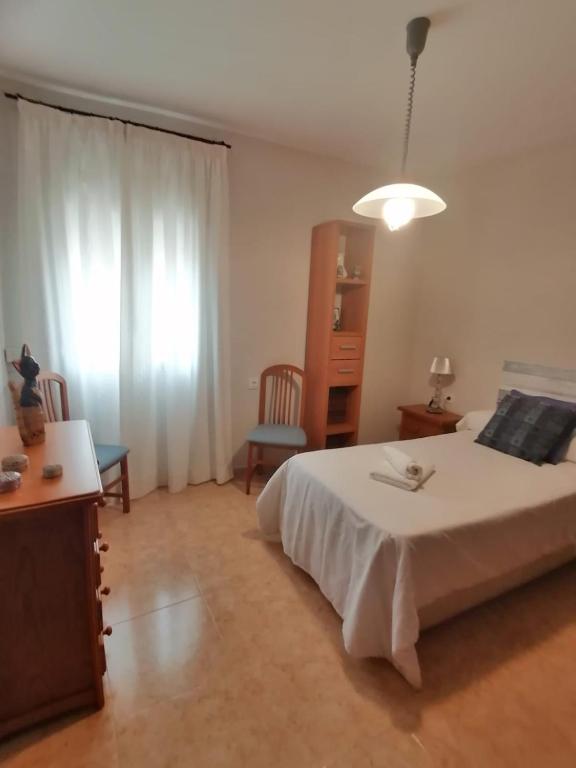 Postel nebo postele na pokoji v ubytování Keka en Playa la Victoria con Ascensor Grupo AC Gestion
